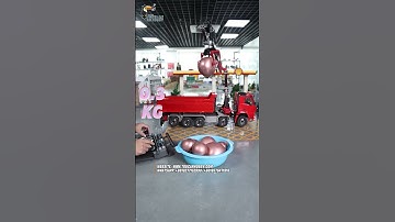 1/14 RC hydraulic crane dump truck with a metal  claw grab for a water balloon grabbing challenge!