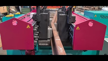 Rail kink bending on a Stierli horizontal rail bending and straightening machine.