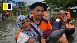 Dozens die in Indonesian floods and landslides