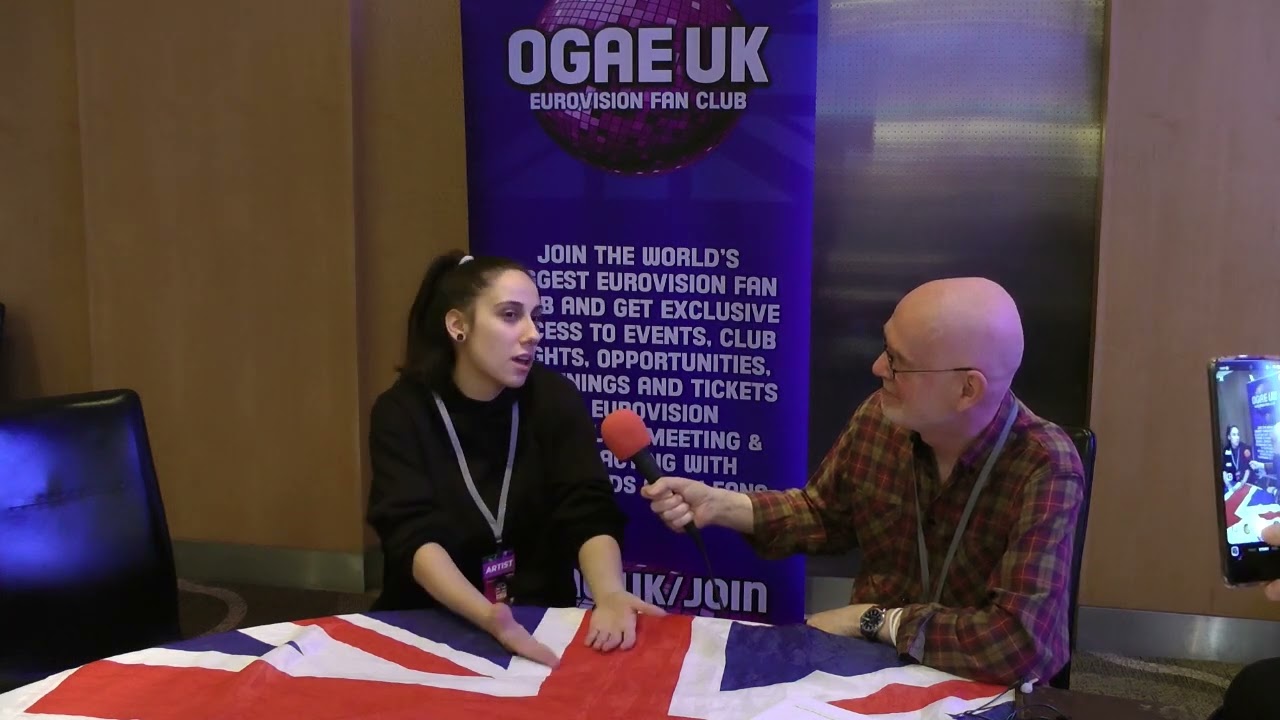 OGAE UK's Robin Scott talks to Andrea from North Macedonia at the London Eurovision Party 2022