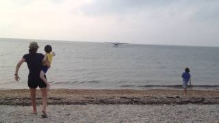 Fly The Whale Approaching Montauk's Navy Beach with Nancy Atlas live in the background!