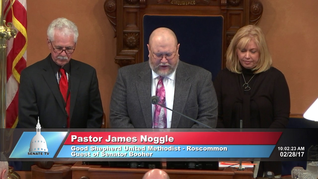 Sen. Booher welcomes Pastor Noggle to deliver the invocation at the Michigan Senate