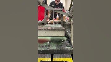 Cutting a beam with a top down saw to demonstrate the effects of residual stress