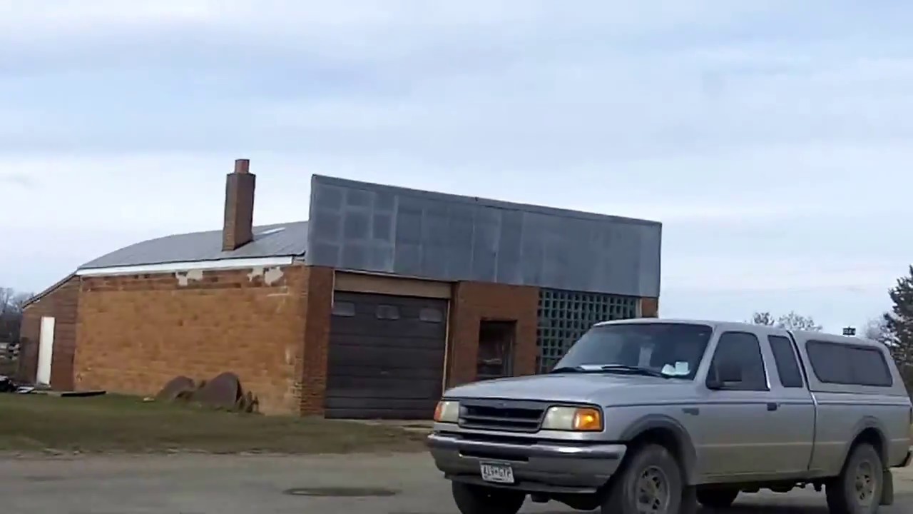 randy wilder rockford il Evergreen Minnesota with two closed buildings and very little snow.
