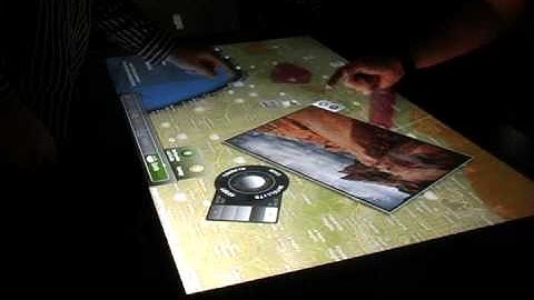 Multitouch Google Maps and Flickr Mashup built with Flash