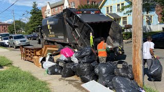 Mack MRU Loadmaster Garbage Truck Packing a Massive Bulk Pile