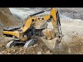 Caterpillar 390D Excavator Loading Caterpillar 775E Dumper And Trucks - Pyramis Ate