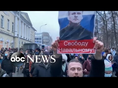 Thousands of Russians take to streets to demand release of jailed opposition leader.