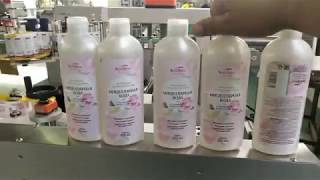oval bottle two sides labeling machine-SKILT