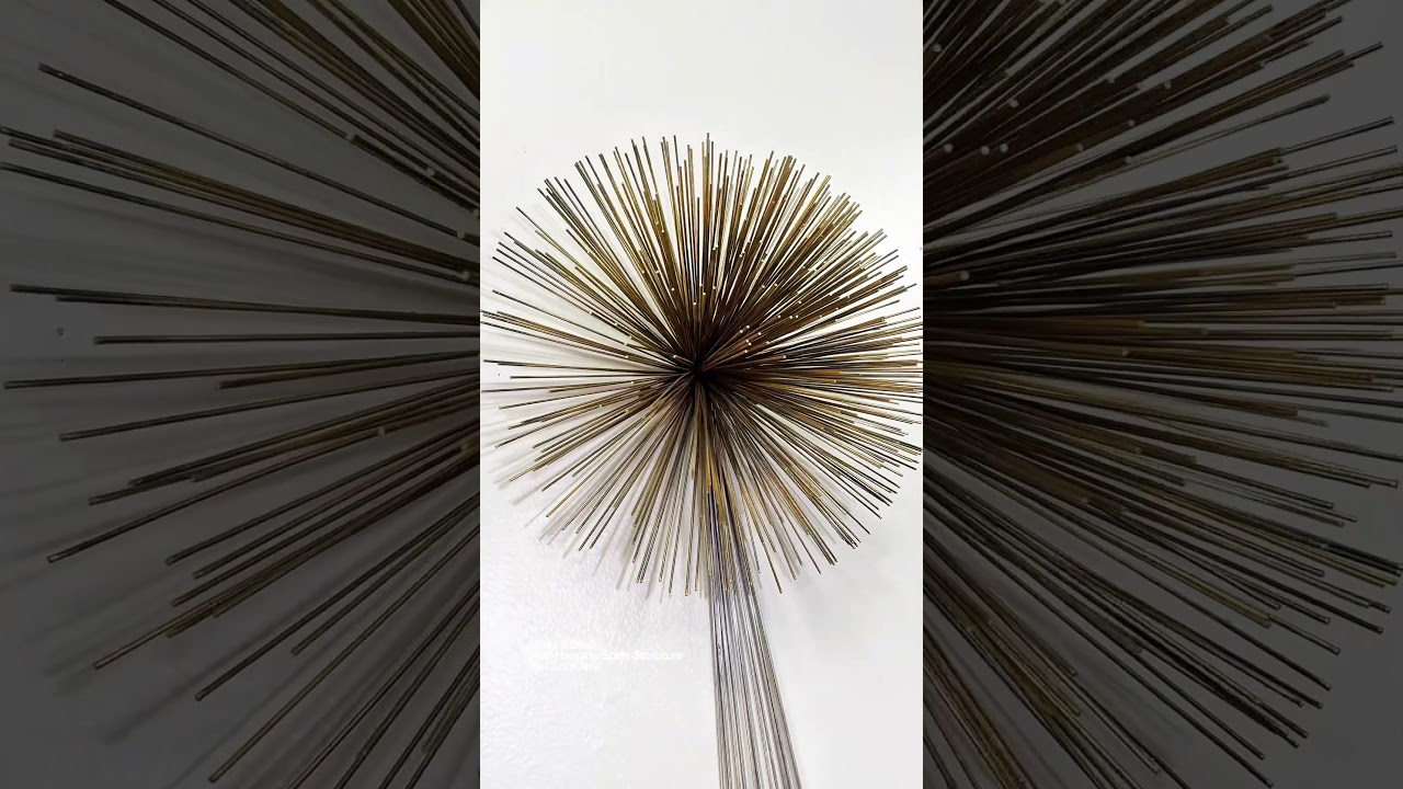 This vintage Curtis Jere wall sculpture is a striking example of