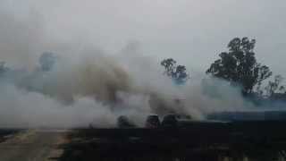 Helicopter waterbombing a Haystack fire