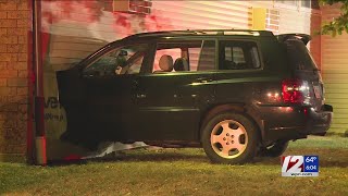 Car crashes into apartment building in East Providence