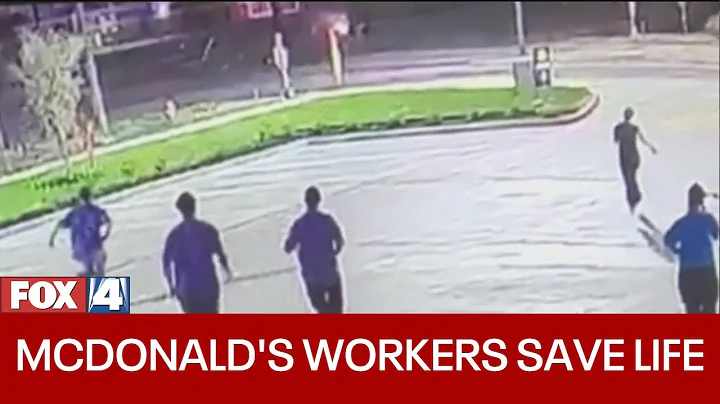 McDonald's employees rescue man from fiery car wre...