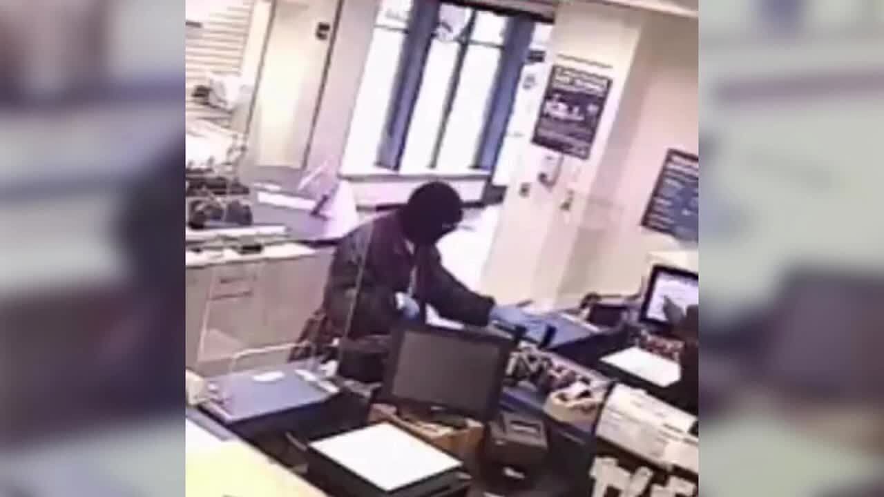 WATCH: Columbia post office robbed at gunpoint, suspect wanted