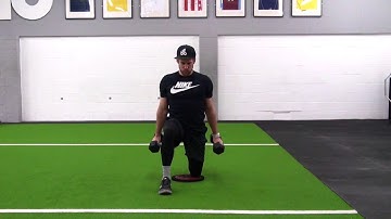 Half kneeling hammer curl to press with dumbbells
