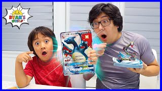 Ryan and Daddy opening Giant Size Pokemon Cards!!!