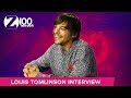 Louis Tomlinson Says 'One Direction Was Not Real Life'