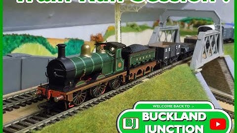 Running model railway trains all afternoon. A train running session we a friend. All four main lines