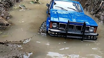 Rc Offroad WPL C24 adventure Enter mudding and water steadily