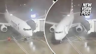 American Airlines plane pushed from gate by 80 mph gusts at Dallas Fort Worth Airport: wild video