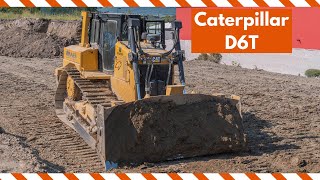 Caterpillar D6T dozer pushing up dirt in Luxembourg