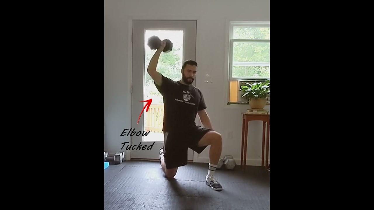 Naxos S&C | Exercise Library: DB Half Kneeling OH Press