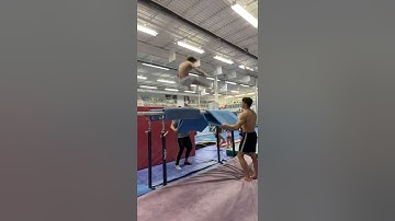 Blaise  -Parallel Bars- front straddle 1 1/4
