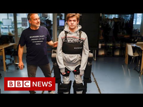 Dad builds robotic exoskeleton to help son walk - BBC News