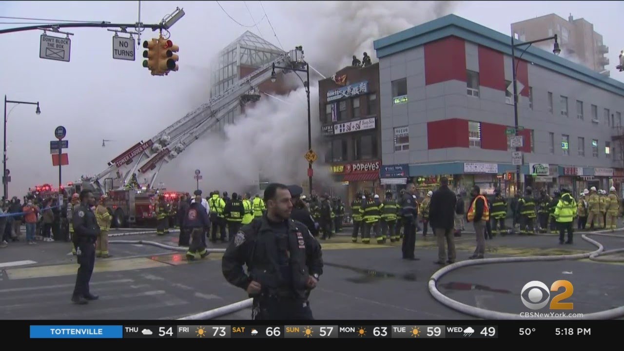 Firefighters battle five-alarm fire in Queens - YouTube