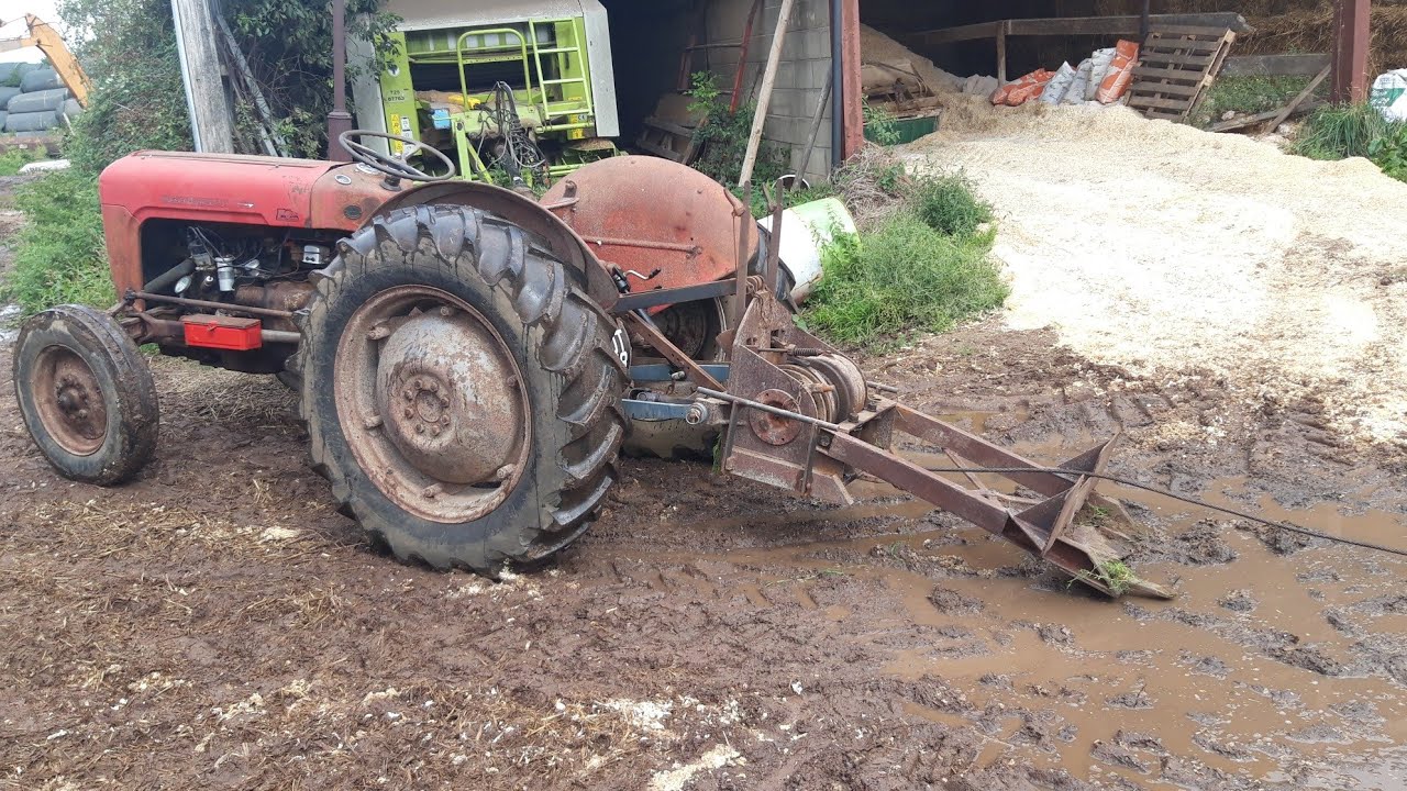 Vintage Thursday. Ferguson linkage winch pulling trees. - YouTube