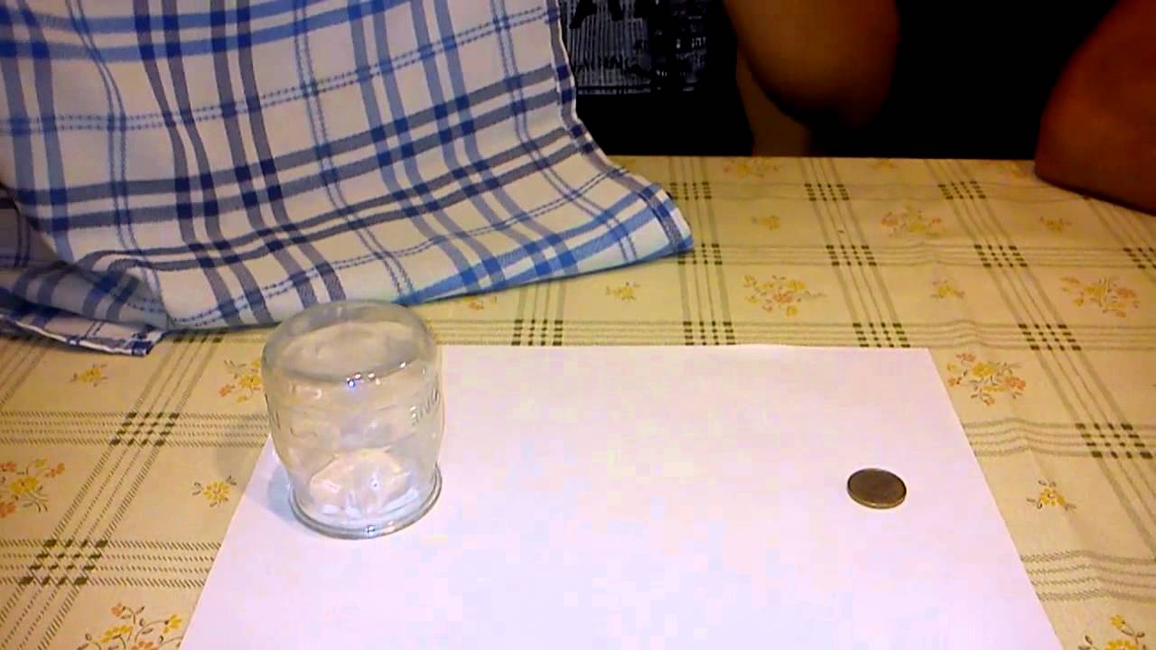 Truco de magia - Desaparecer una moneda con un vaso de cristal. Magic