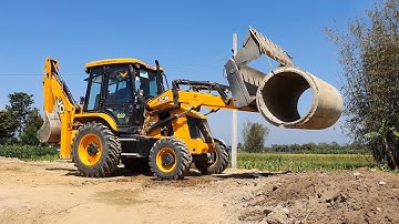 JCB Backhoe Lifting Heavy Concrete Pipe and Putting in Drain - JCB Making Road Ready To Gravel