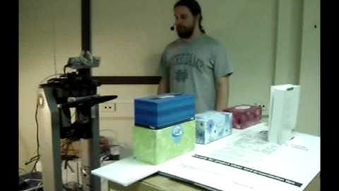 Visual Learning and Spatial Reasoning in a Natural Language Dialogue