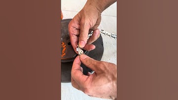 Connecting a chainsaw chain without using any machinery.