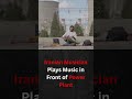 Iranian Musician play Music in front of the power plant