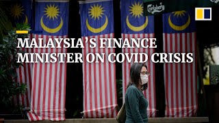 Malaysia’s finance minister pledges collaboration with opposition amid Covid crisis