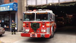 Celebrity FDNY ENGINE 9 RETURNING TO IT'S CANAL ST. FIREHOUSE IN CHINATOWN AREA OF MANHATTAN IN NEW YORK CITY. Profile