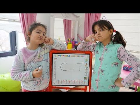 Masal and Öykü learns to write words correctly