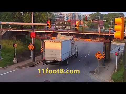 Red-light runner crashes truck into the 11foot8 bridge