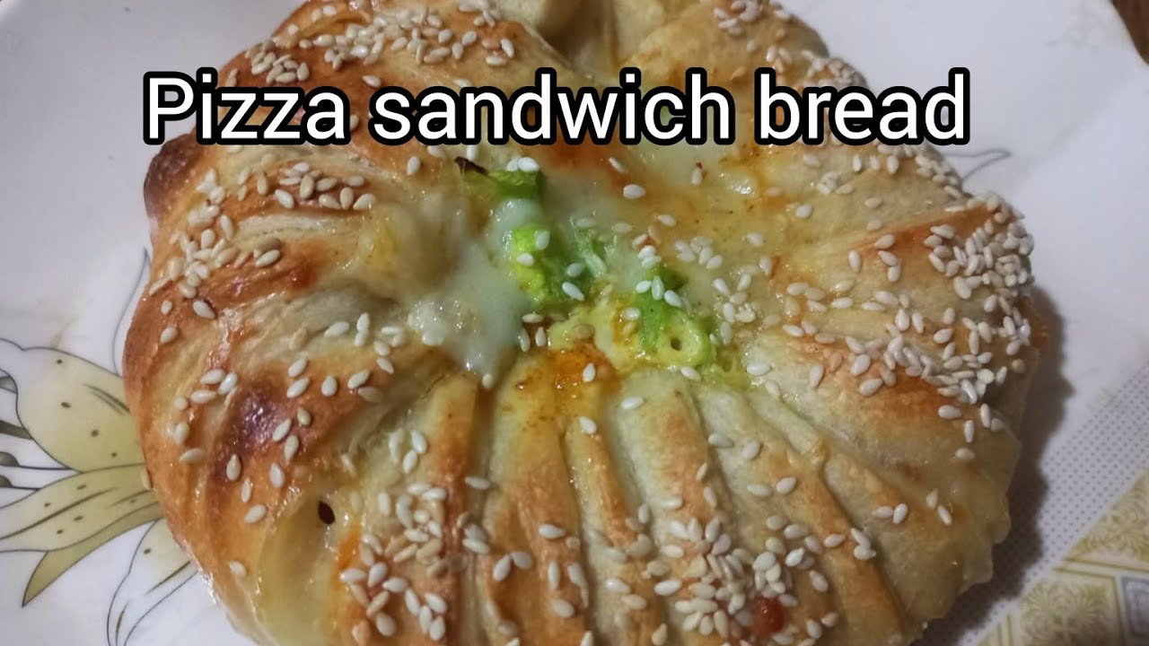 Easy to make pizza sandwich bread recipe with the savory and cheesy flavours of pizza 