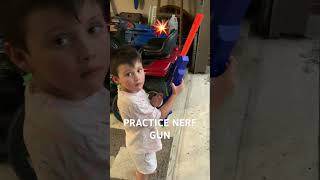 My Boy With His Practice Nerf Rifle