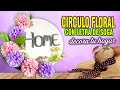 Circulo floral con cartón reciclado para decorar tu hogar