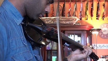 Daniel Lopez tests the Stingray Electric Violin at Animato Strings