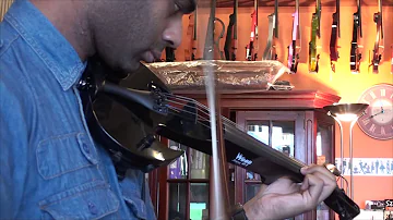 Daniel Lopez tests the Stingray Electric Violin at Animato Strings
