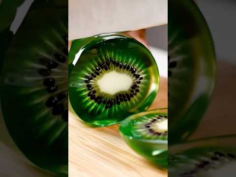 Cutting crystal fruit never sounded this good 🍇✨ Let your brain melt with this AI-generated ASMR.