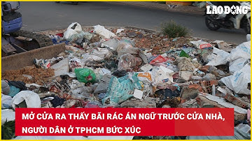 Mở cửa ra thấy bãi rác án ngữ trước cửa nhà, người dân ở TPHCM bức xúc | Báo Lao Động