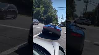 Lamborghini almost rolls back into Porsche while revving 😱