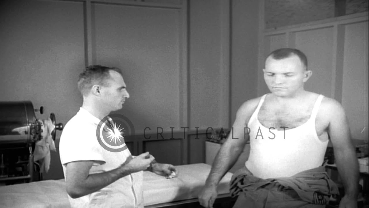 A doctor inoculates American airmen at Albrook Air Force Base in Panama HD Stock Footage