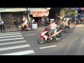 caroline crosses a street in vietnam