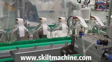 SKILT bottle cap tax stamp L shap labeling machine specially for whisky bottle wine bottle